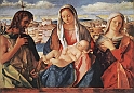 BELLINI GIOVANNI (1426-1516) - Madonna e bambino con S. Giovanni Battista e Santi (1500-1504)